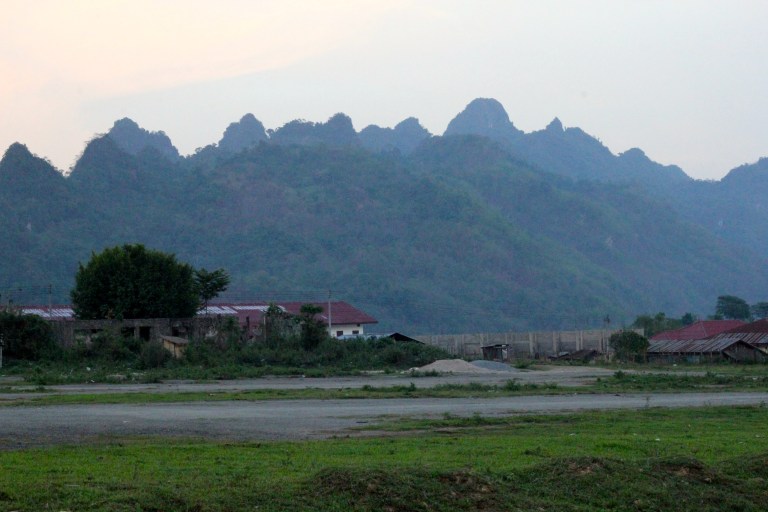 the airstrip runs the length of the village